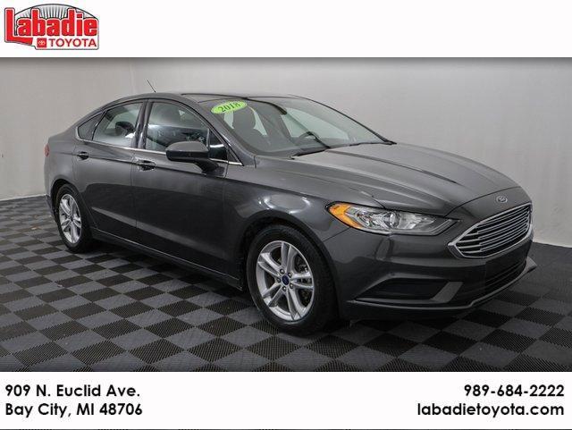 used 2018 Ford Fusion car, priced at $11,017
