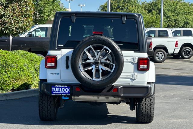 used 2024 Jeep Wrangler 4xe car, priced at $35,887
