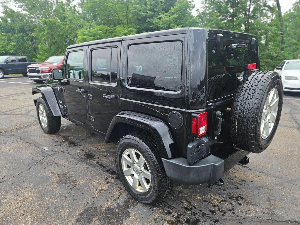 used 2016 Jeep Wrangler Unlimited car, priced at $18,380