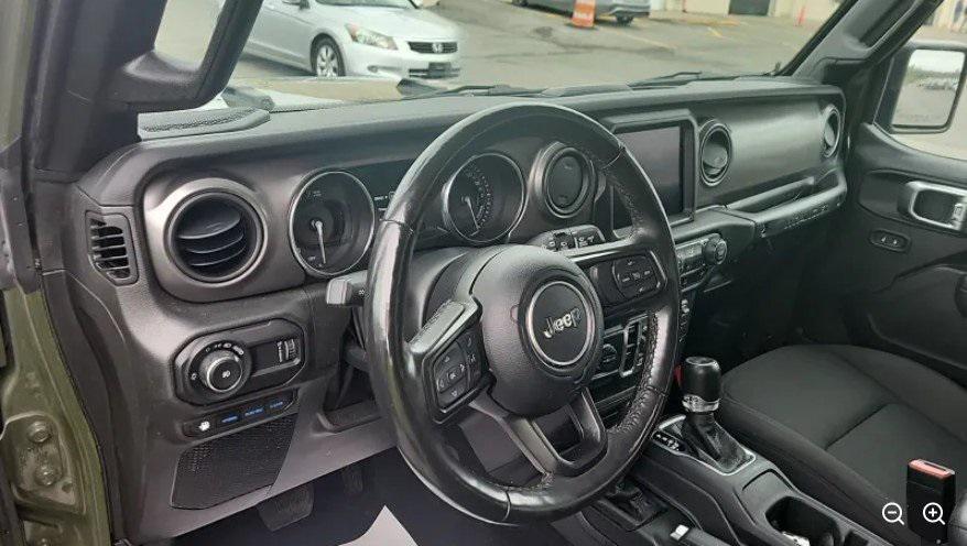 used 2023 Jeep Wrangler 4xe car, priced at $31,000