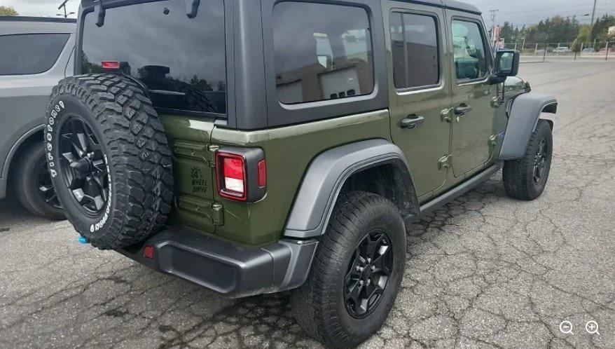 used 2023 Jeep Wrangler 4xe car, priced at $31,000