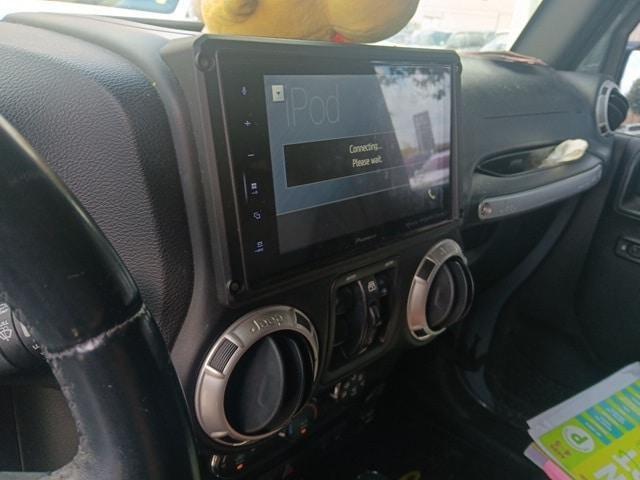 used 2015 Jeep Wrangler Unlimited car, priced at $16,991