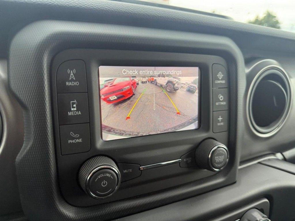 used 2021 Jeep Wrangler Unlimited car, priced at $31,676