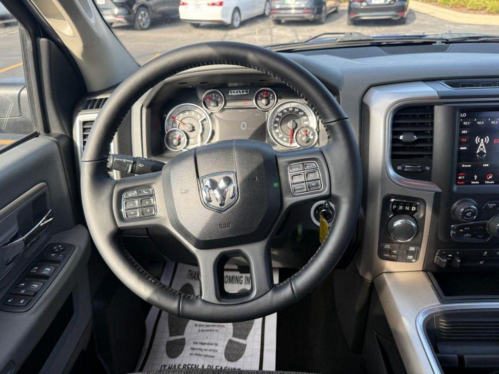 used 2018 Ram 1500 car, priced at $24,956