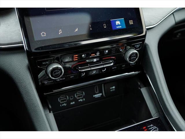 used 2023 Jeep Grand Cherokee L car, priced at $49,999