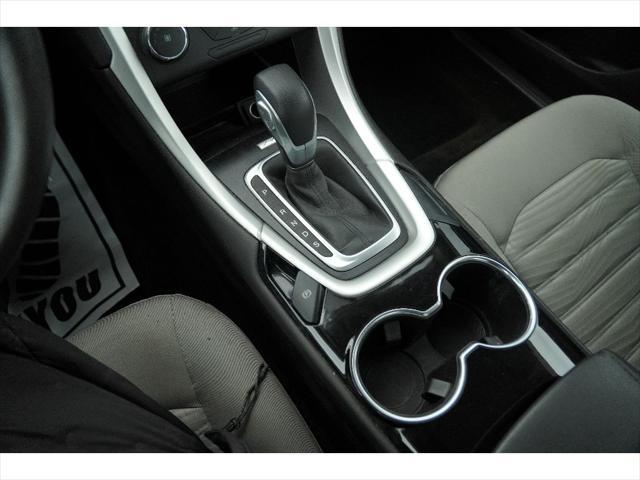 used 2016 Ford Fusion car, priced at $12,801