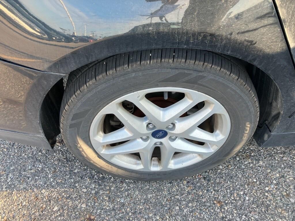 used 2014 Ford Fusion car, priced at $7,000