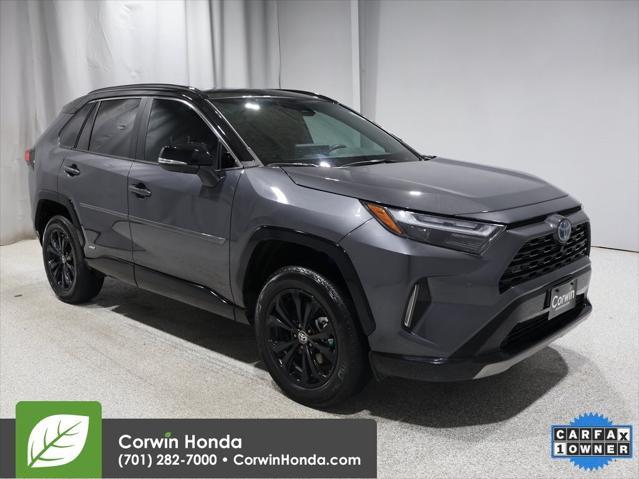 used 2023 Toyota RAV4 Hybrid car, priced at $40,000