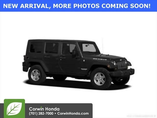 used 2010 Jeep Wrangler Unlimited car, priced at $13,500