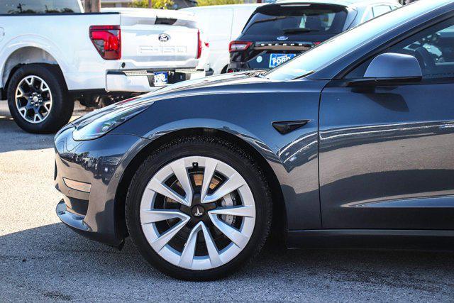 used 2022 Tesla Model 3 car, priced at $25,500