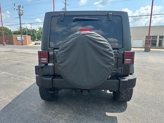 used 2012 Jeep Wrangler Unlimited car, priced at $15,995
