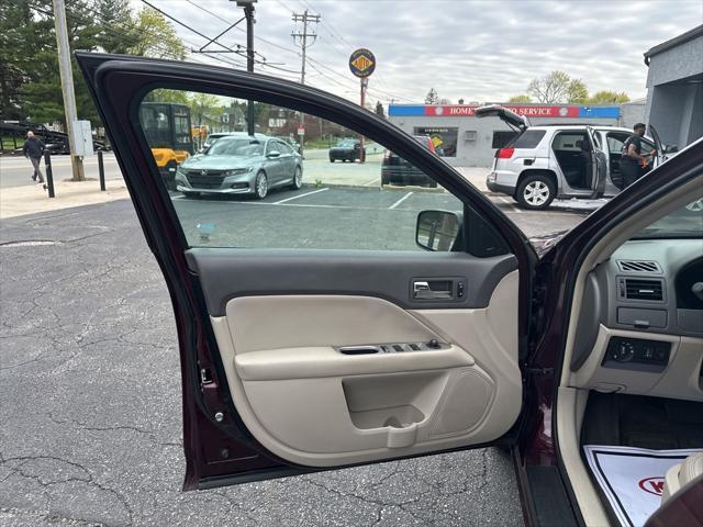 used 2011 Ford Fusion car, priced at $9,999