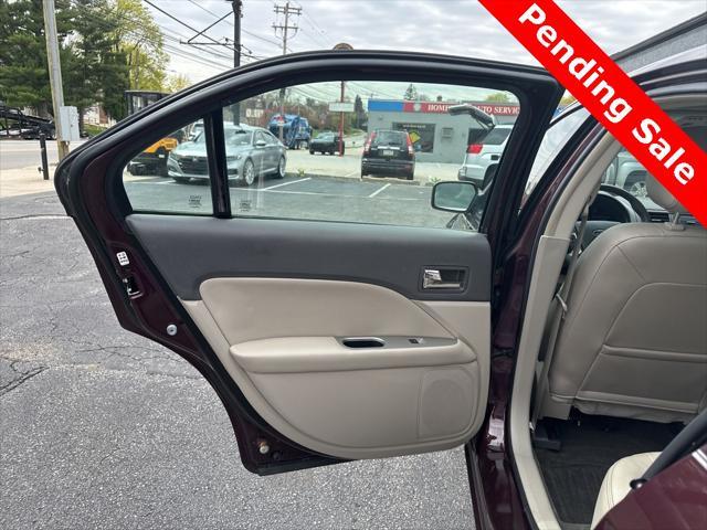used 2011 Ford Fusion car, priced at $9,999