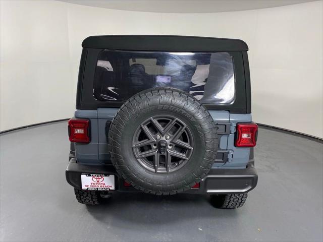 used 2024 Jeep Wrangler car, priced at $35,952