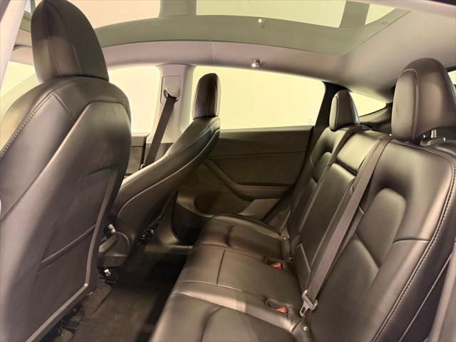 used 2021 Tesla Model Y car, priced at $28,497