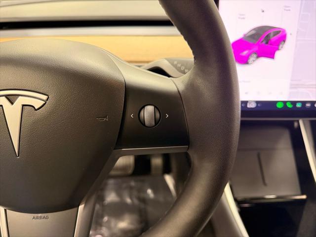 used 2021 Tesla Model Y car, priced at $28,497