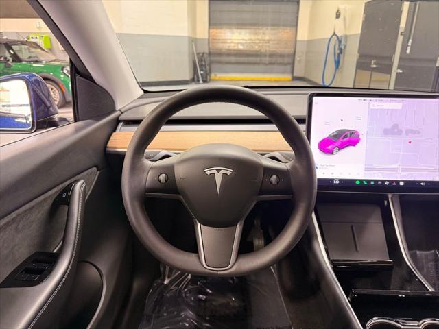 used 2021 Tesla Model Y car, priced at $28,497