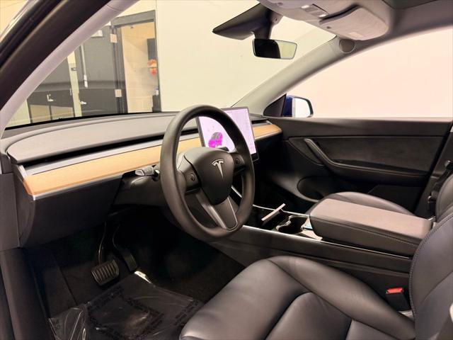 used 2021 Tesla Model Y car, priced at $28,497