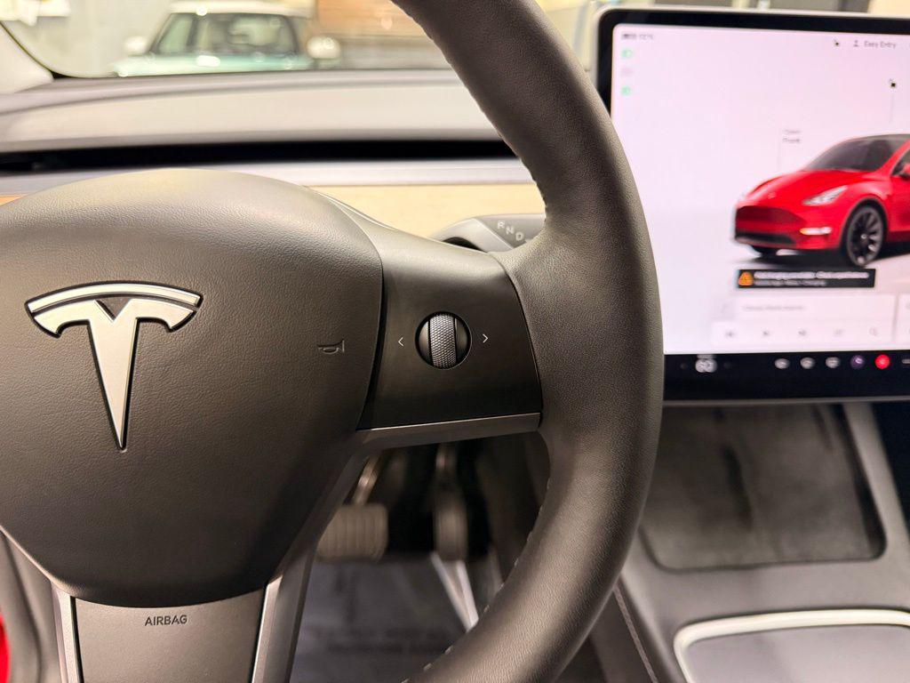 used 2023 Tesla Model Y car, priced at $33,299