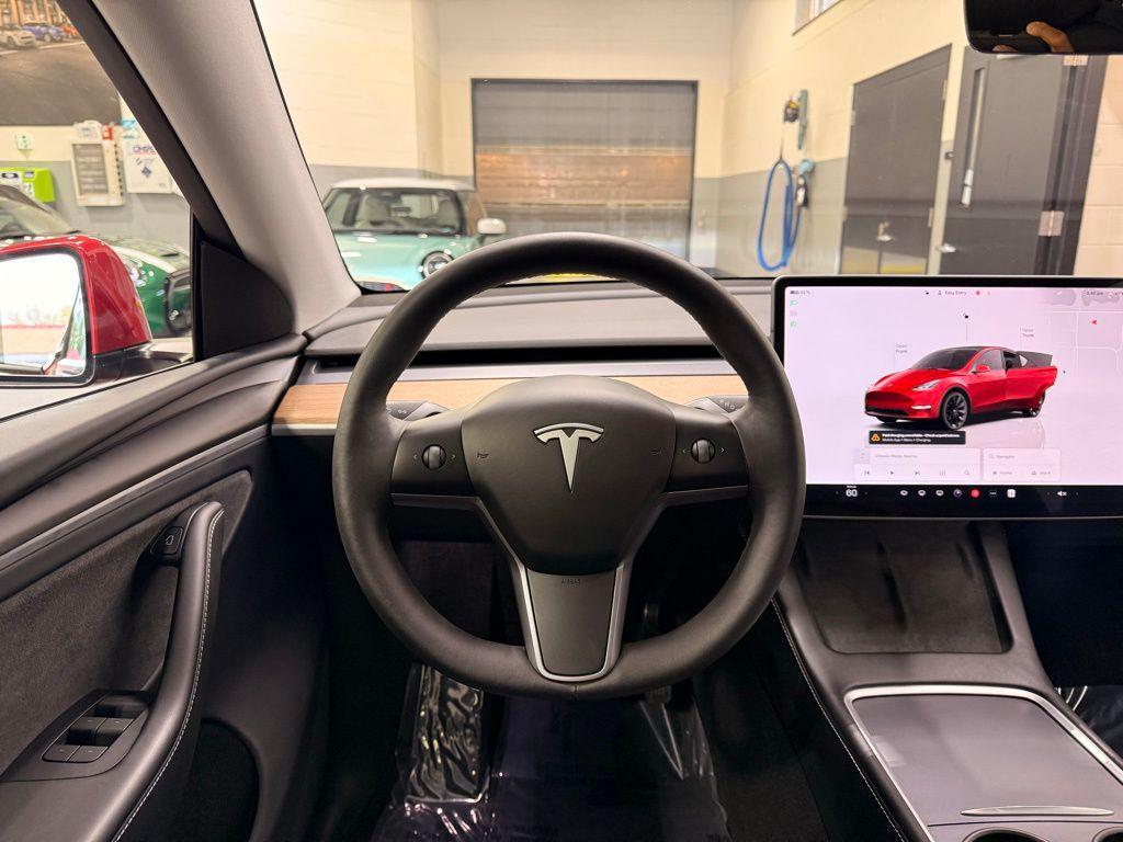 used 2023 Tesla Model Y car, priced at $33,299