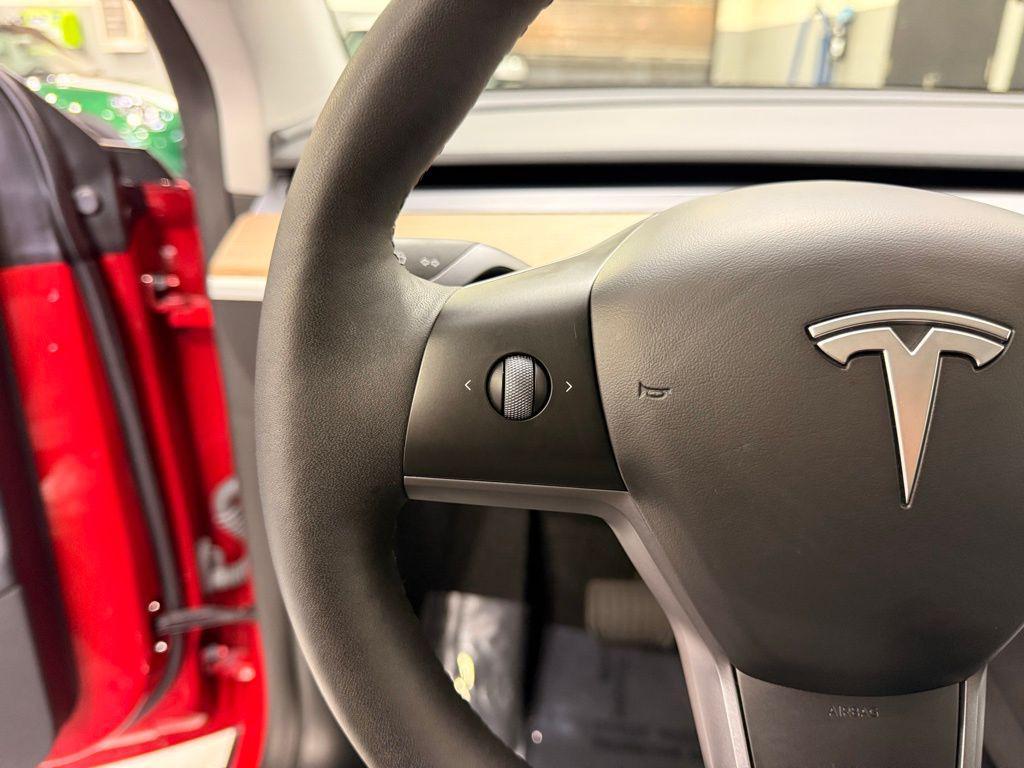 used 2023 Tesla Model Y car, priced at $33,299