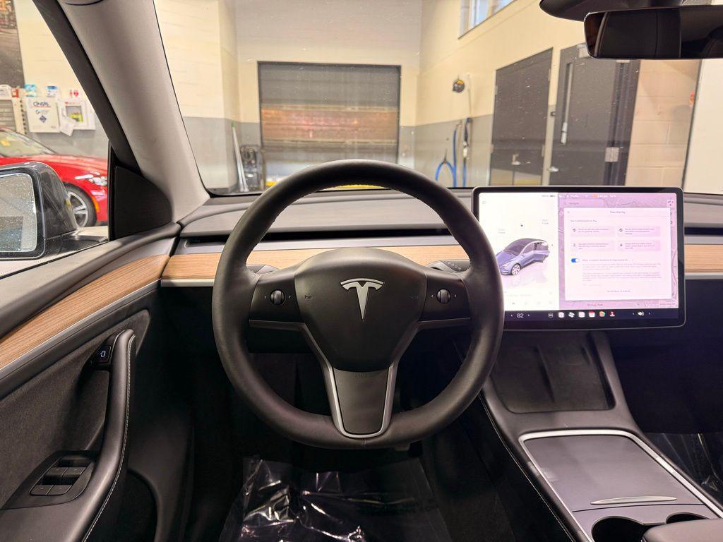 used 2023 Tesla Model Y car, priced at $33,499