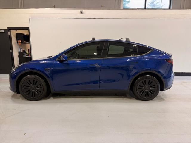 used 2023 Tesla Model Y car, priced at $32,999