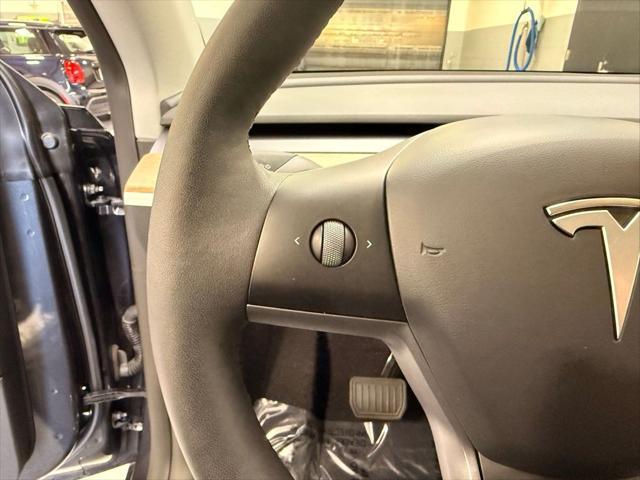 used 2024 Tesla Model Y car, priced at $34,499