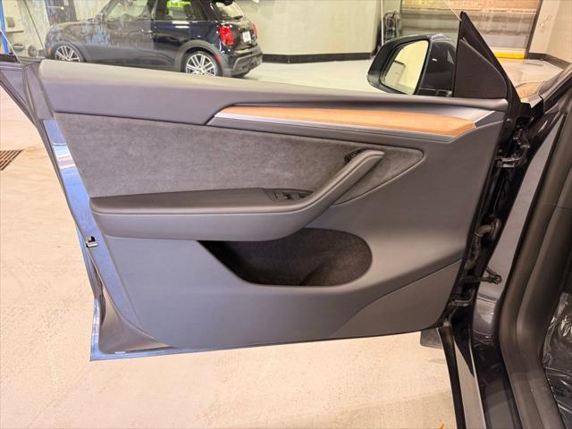 used 2024 Tesla Model Y car, priced at $34,499