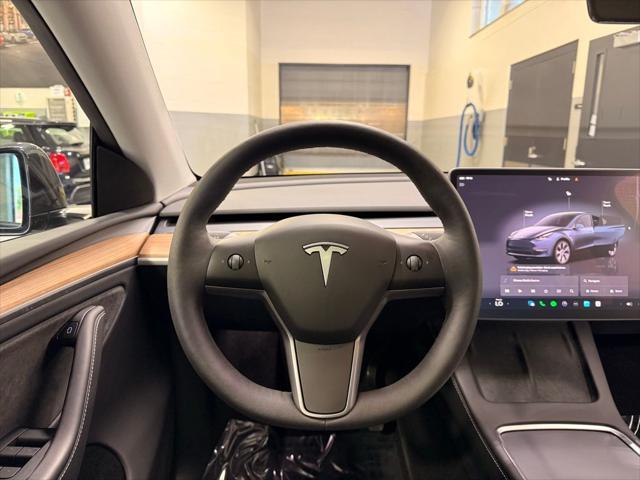 used 2024 Tesla Model Y car, priced at $34,499