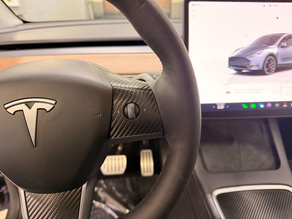 used 2023 Tesla Model Y car, priced at $33,499