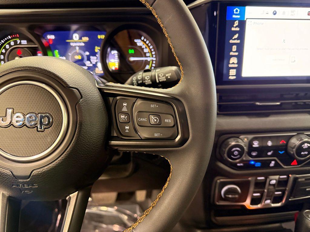 used 2024 Jeep Wrangler 4xe car, priced at $32,899