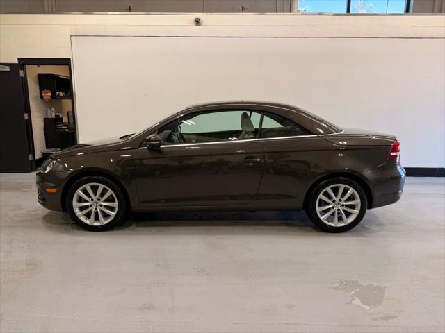 used 2015 Volkswagen Eos car, priced at $14,999