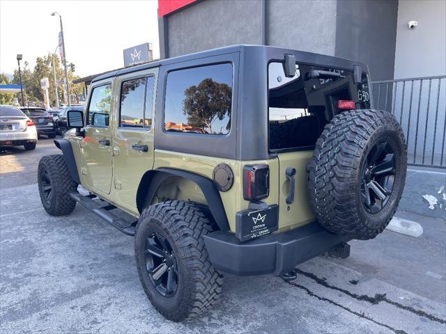 used 2013 Jeep Wrangler Unlimited car, priced at $16,999
