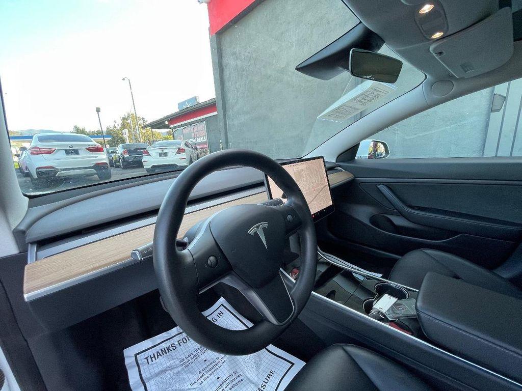 used 2020 Tesla Model 3 car, priced at $17,999