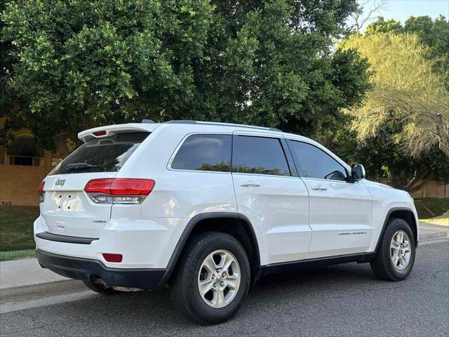 used 2015 Jeep Grand Cherokee car, priced at $10,000