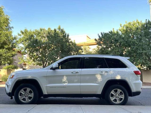 used 2015 Jeep Grand Cherokee car, priced at $10,000