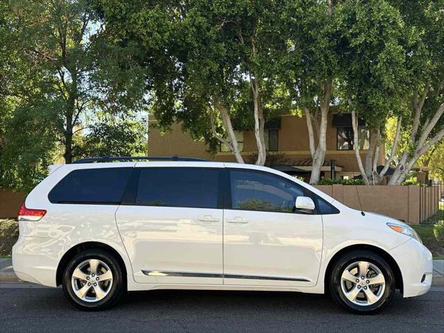 used 2014 Toyota Sienna car, priced at $12,000