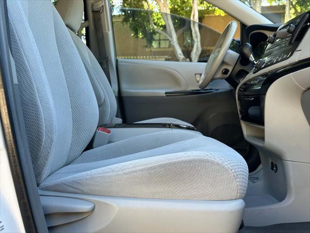 used 2014 Toyota Sienna car, priced at $12,000