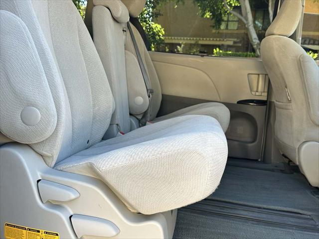 used 2014 Toyota Sienna car, priced at $12,000