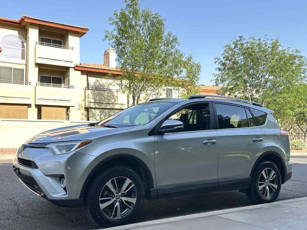 used 2018 Toyota RAV4 car, priced at $14,300