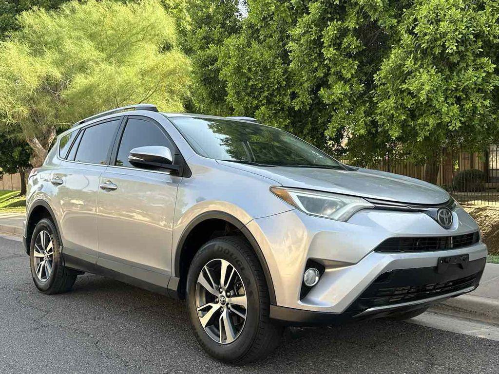 used 2018 Toyota RAV4 car, priced at $14,300
