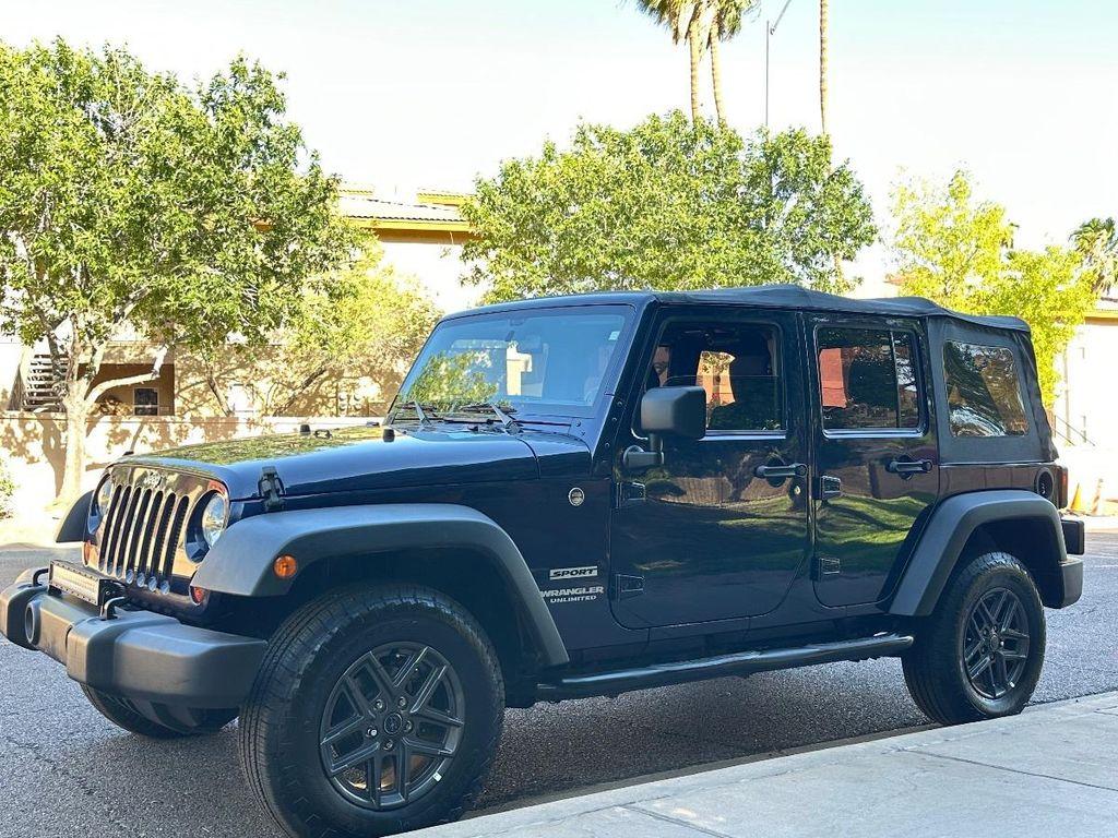 used 2013 Jeep Wrangler Unlimited car, priced at $13,000