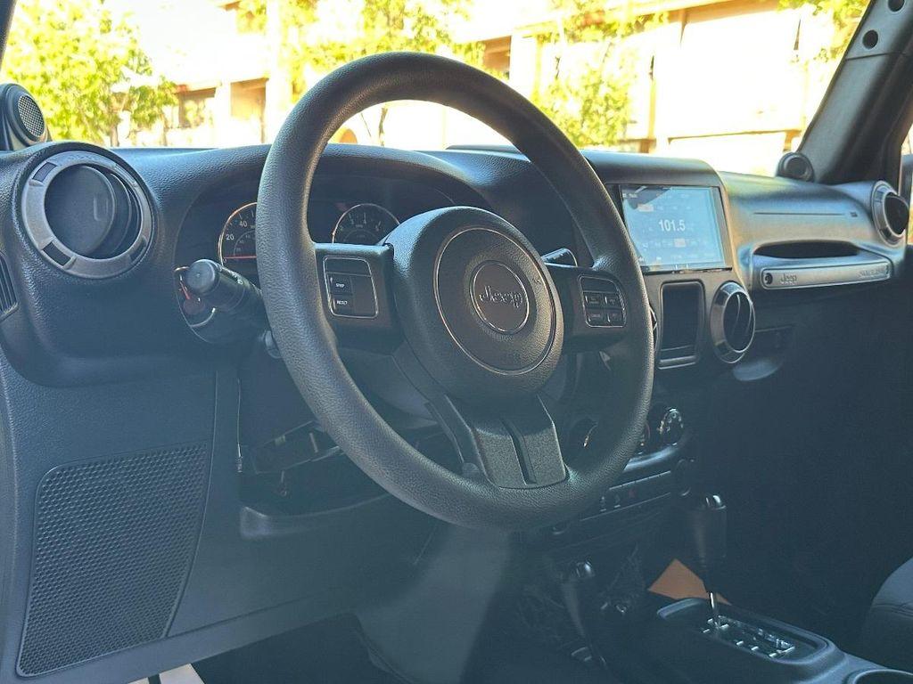 used 2013 Jeep Wrangler Unlimited car, priced at $13,000