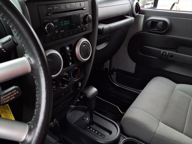 used 2009 Jeep Wrangler Unlimited car, priced at $13,990