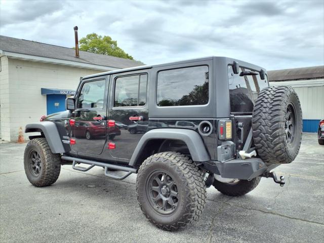 used 2011 Jeep Wrangler Unlimited car, priced at $19,990