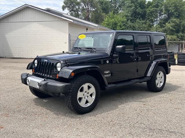 used 2011 Jeep Wrangler Unlimited car, priced at $14,990