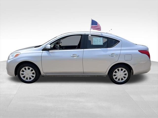 used 2012 Nissan Versa car, priced at $5,500