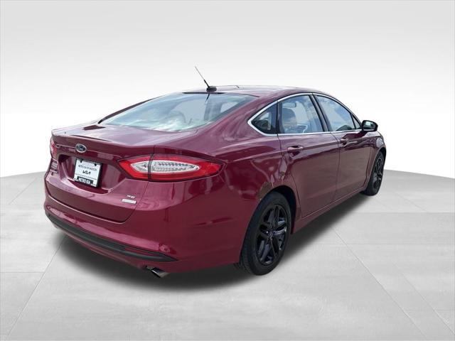 used 2014 Ford Fusion car, priced at $7,800