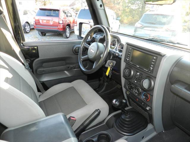 used 2010 Jeep Wrangler Unlimited car, priced at $13,600